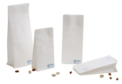 Упаковочные аксессуары Белые бумажные пакеты и пакеты с плоским дном и окошком.